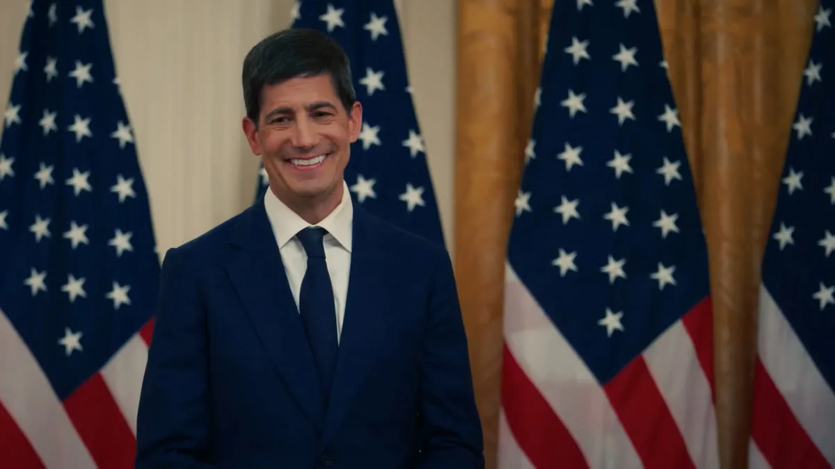 Federal Reserve Chair Kevin Warsh in front of US flags at the White House
